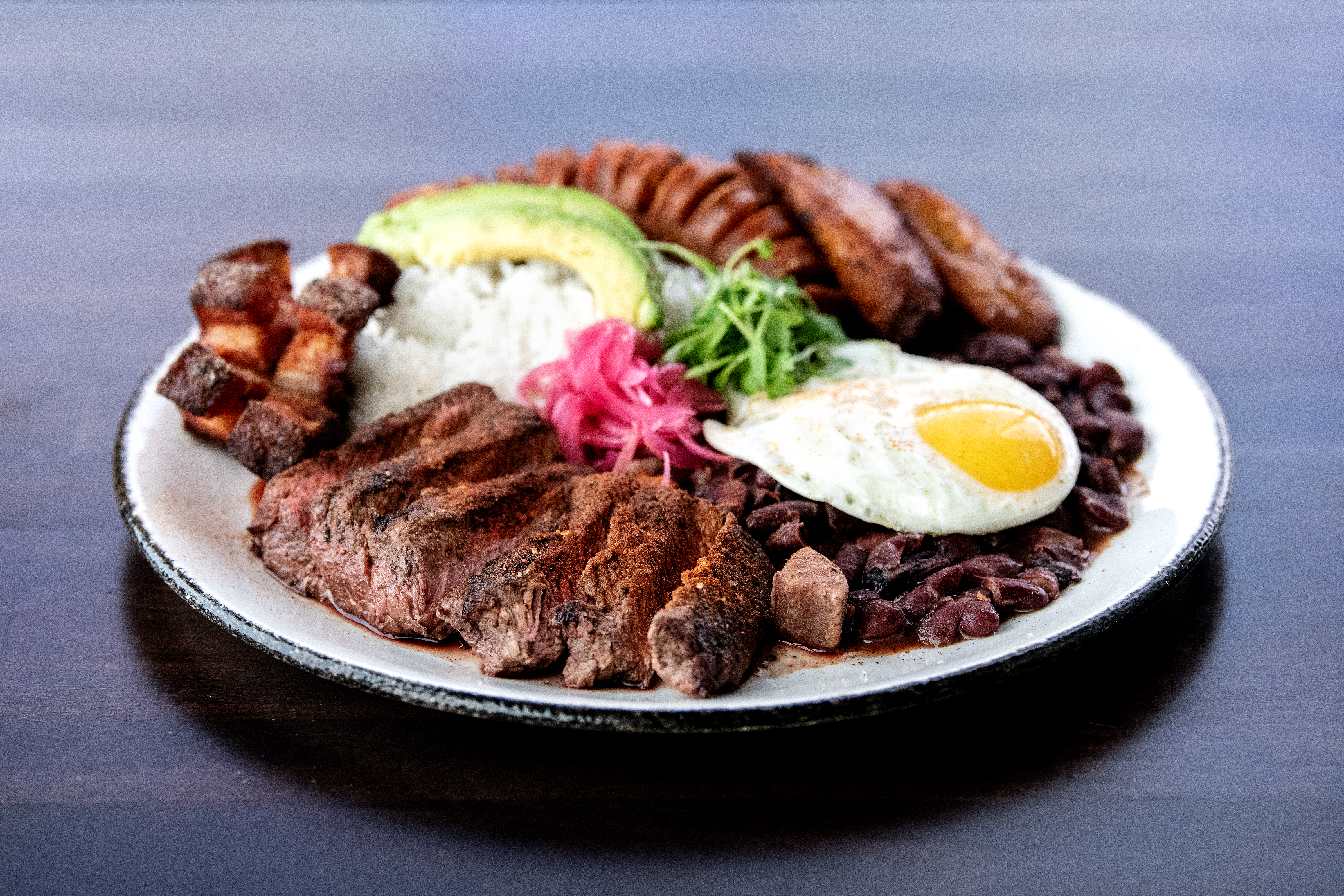 Feast on Colombian hot dogs and bandeja paisa at Selva - Vimarsana News