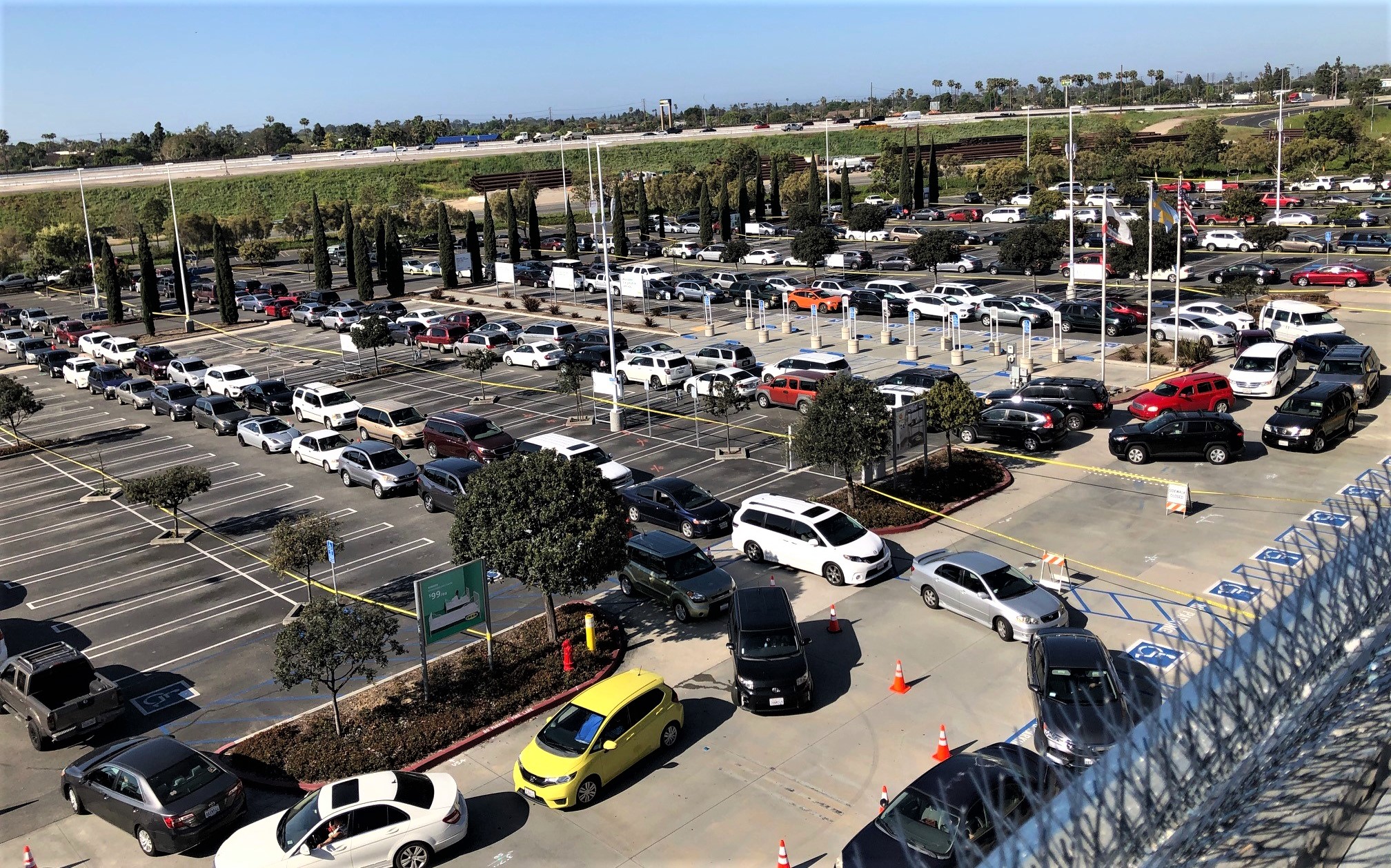 Volunteers close the trunk on 14 months of food giveaways at IKEA in Costa Mesa - Vimarsana News