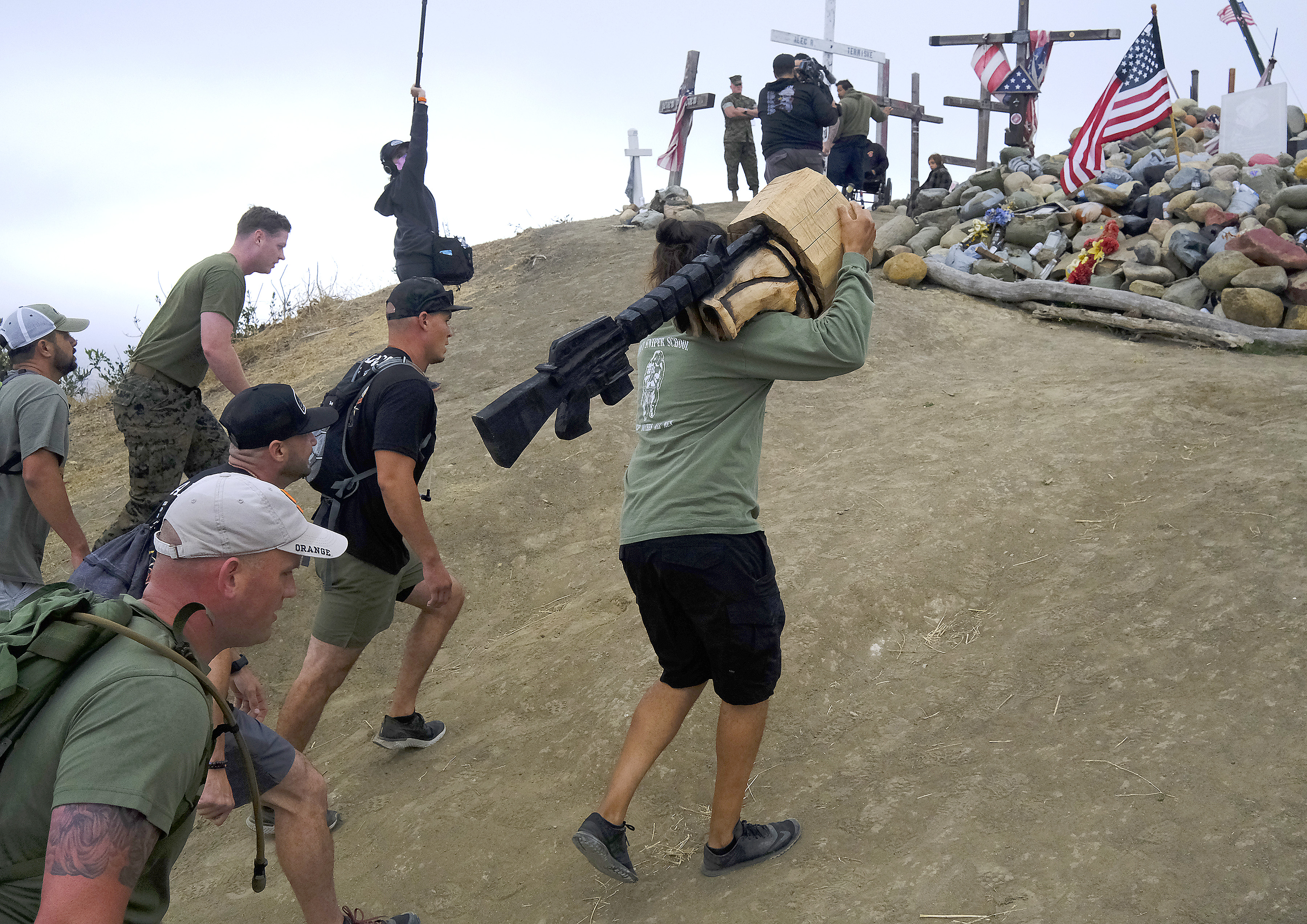 A solemn hike, a carving and closure. Marine survivors of Afghanistan's deadly Sangin Valley reunite - Vimarsana News