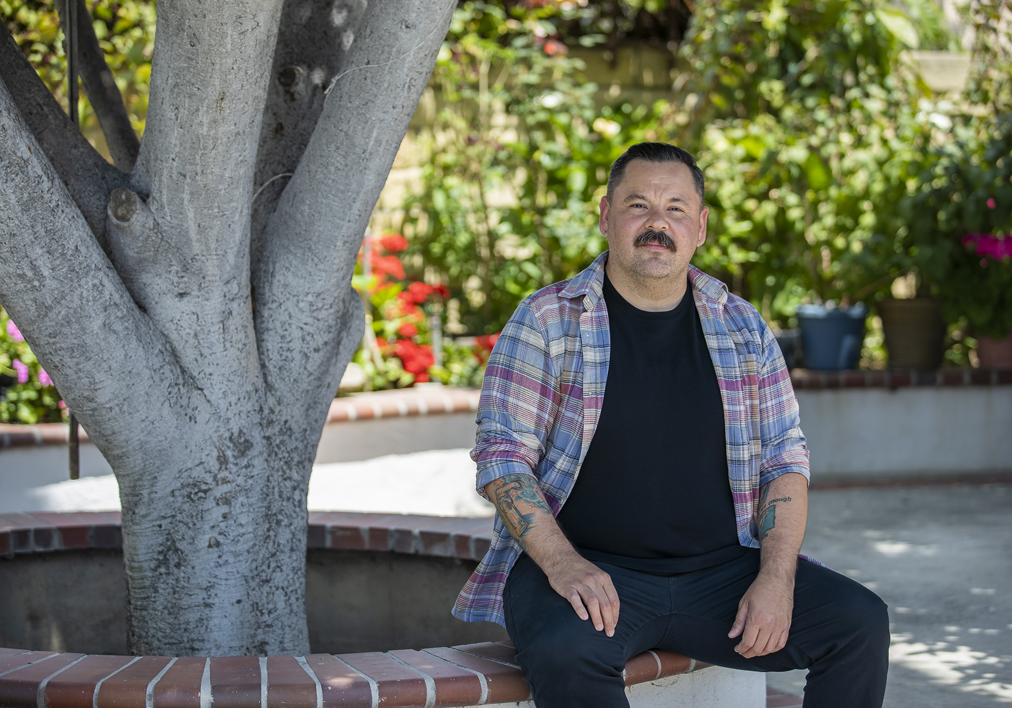 Santa Ana poet talks about coming of age in his debut poetry book 'Flower Grand First' - Vimarsana News