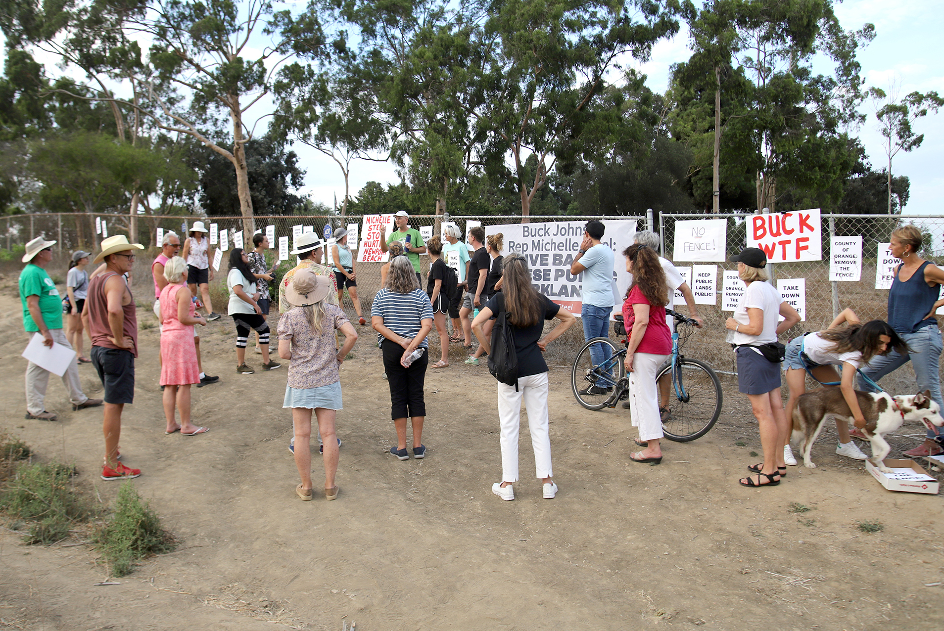 Protestors gather in the Back Bay, calling for the removal of fence around county parkland - Vimarsana News