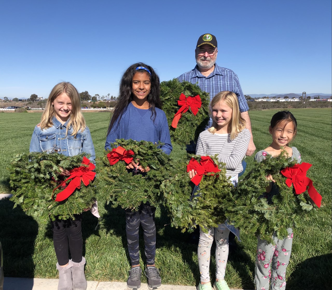 Junior Girl Scout Troop 3925 members lay wreaths at Miramar National Cemetery for veterans - Vimarsana News