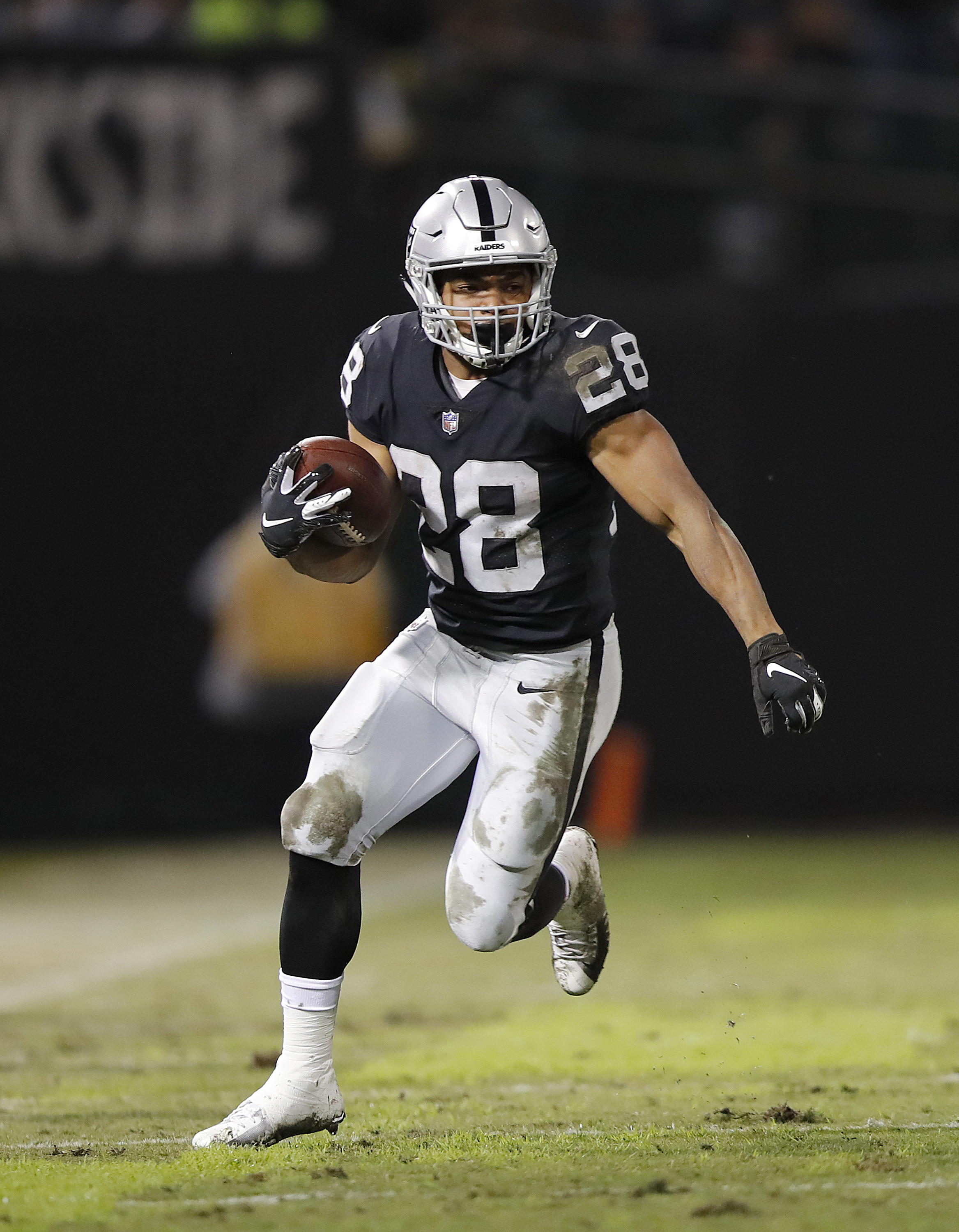 Doug Martin running with the ball for the Oakland Raiders