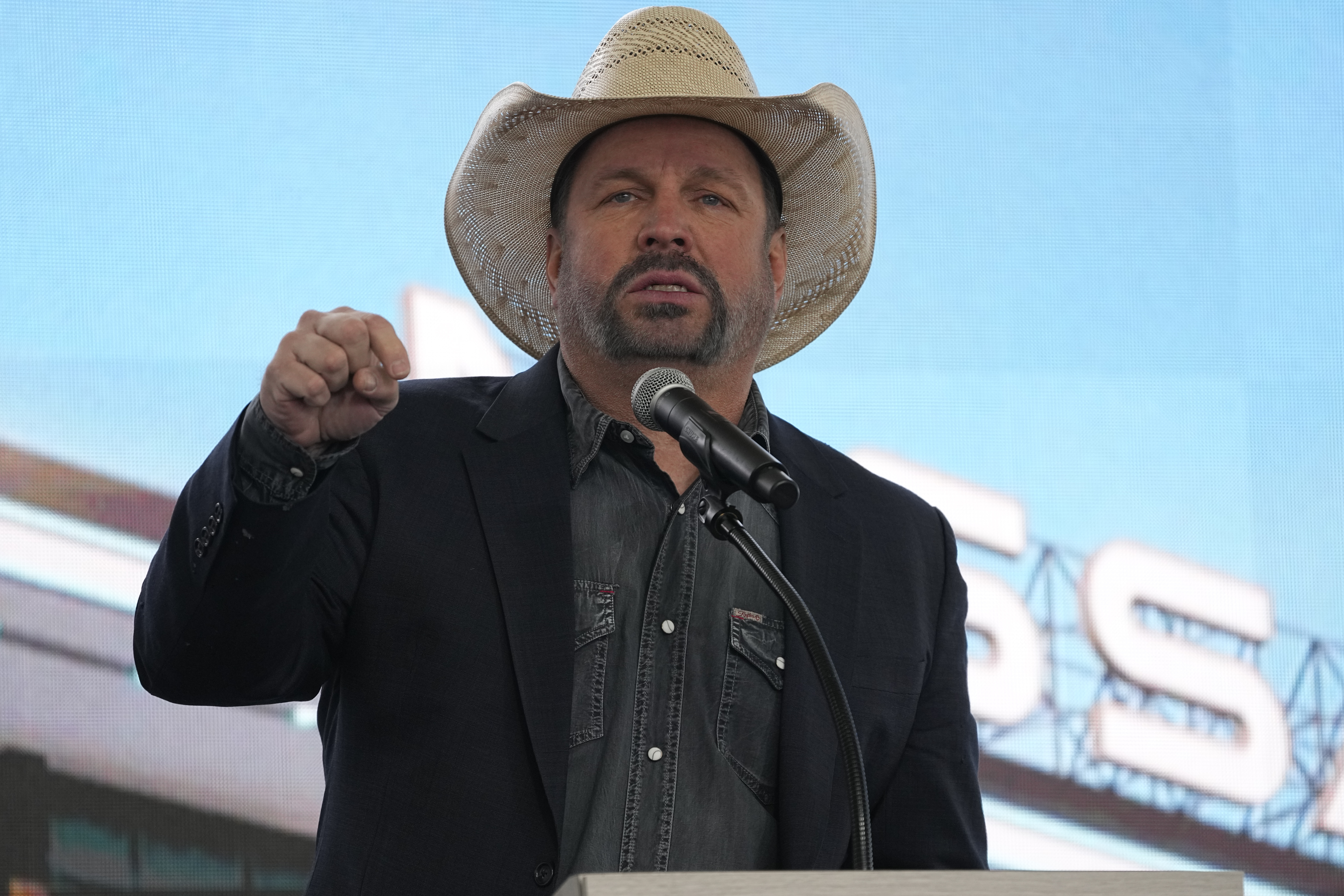 Garth Brooks 'outed' his rape accuser, alleging she made him 'victim of a shakedown'